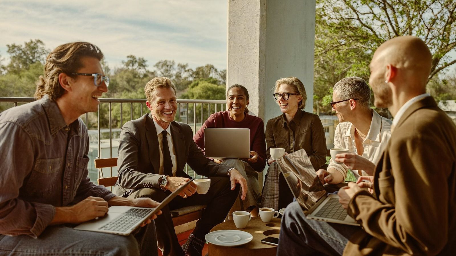 BeHost colleagues laughing together at the annual company offsite